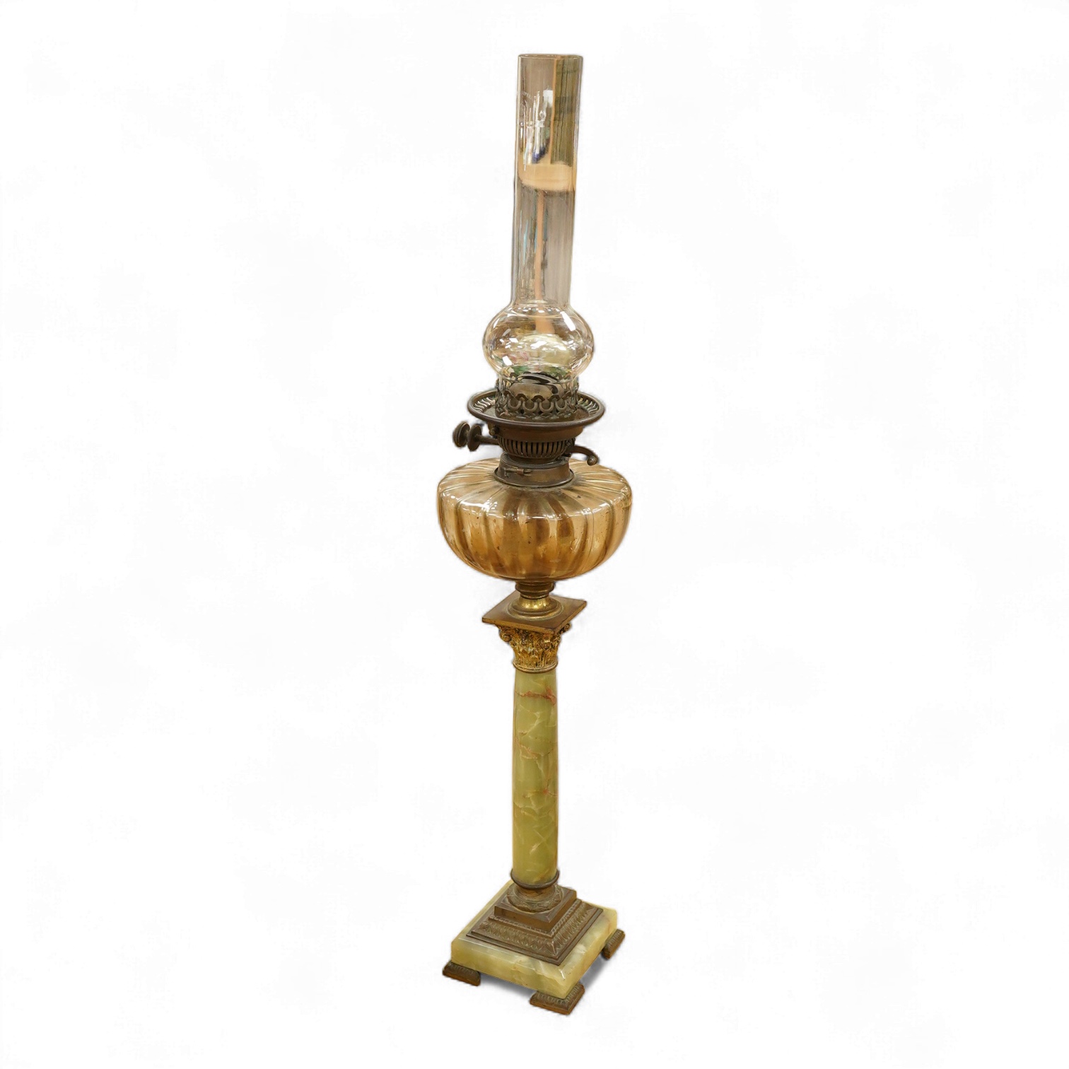 An onyx oil lamp with glass reservoir, 82cm high